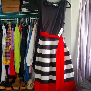 Beautiful striped dress with red bottom and sash..absolutely gorgeous 😍 ❤️